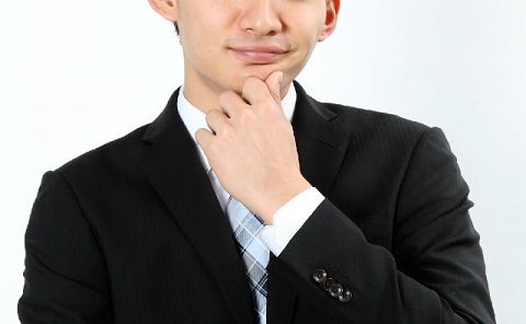 考える人